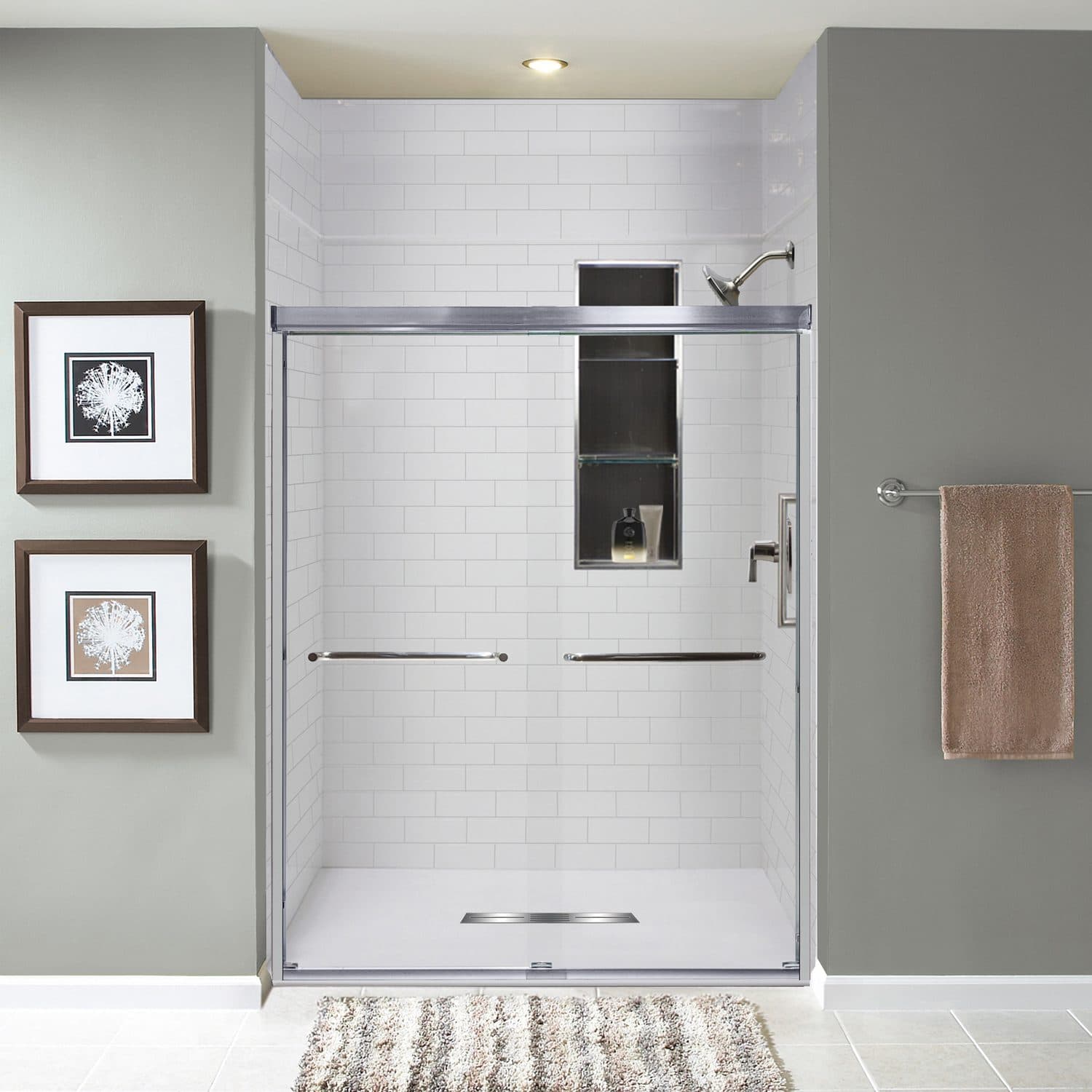 Tub-to-shower conversion with white subway tile pattern walls and a chrome sliding door